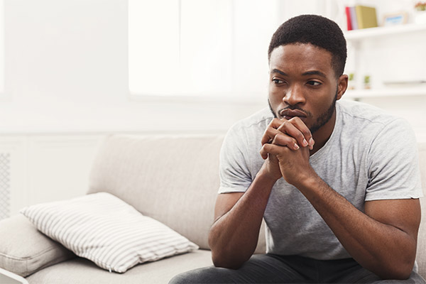 Young man in deep thought