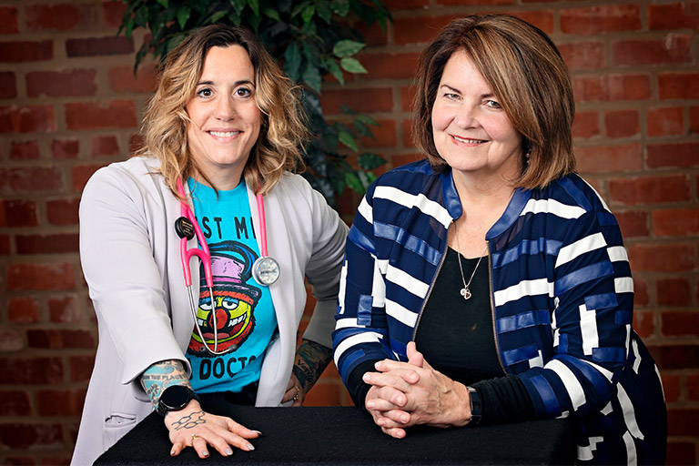 Photo of Dr. Labor and Bobbi Douglas next to each other